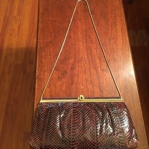 Vintage snake skin with suede interior. Italian.